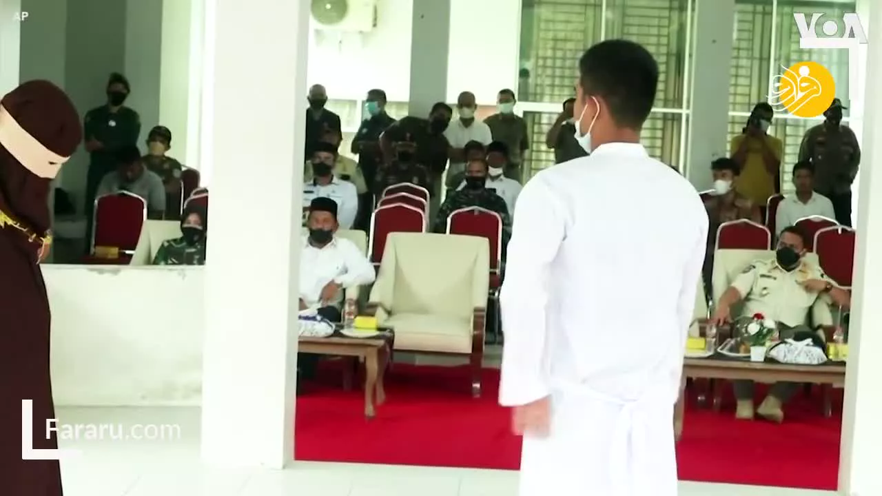 شلاق زدن یک زن و مرد در ملأعام