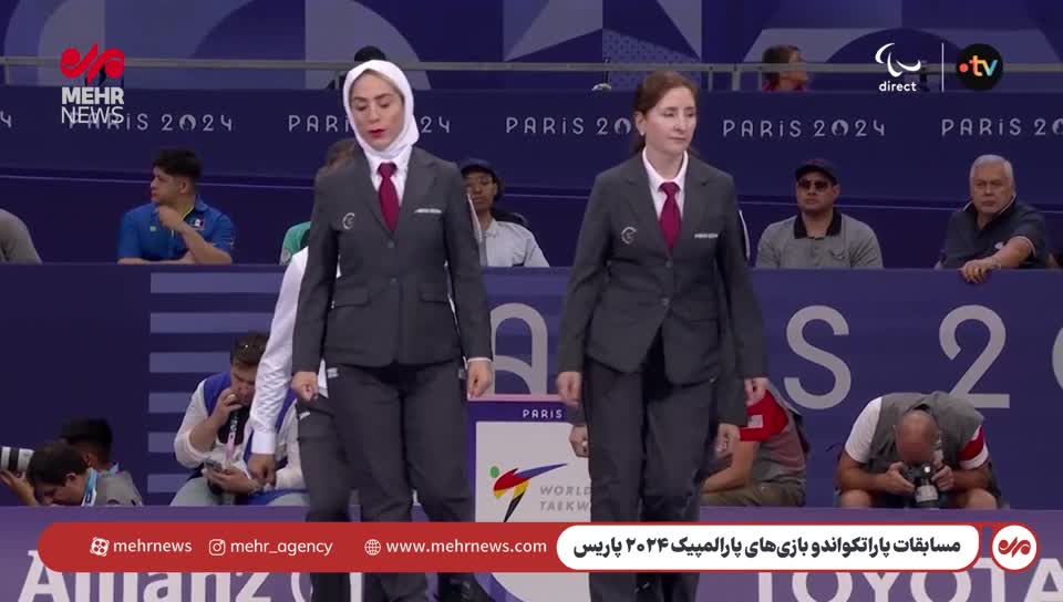   استایل جالب مرجان تیموری داور بین المللی ایران؛ لحظه ورود به سالن برای قضاوت رقابت پاراتکواندو در پاریس