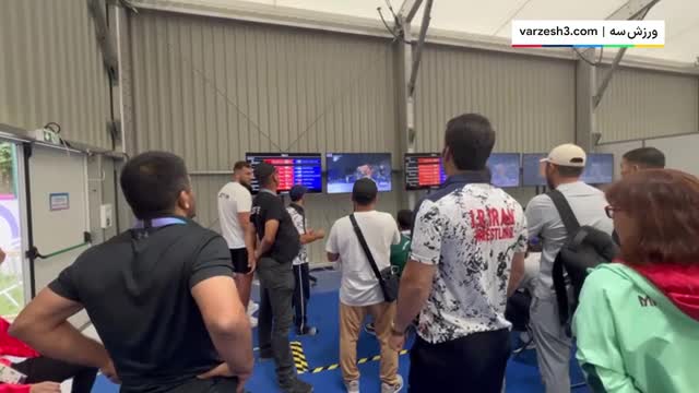 فریادهای یا امام رضای علیرضا دبیر در پشت صحنه فینال کشتی المپیک