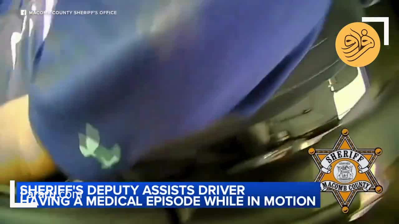   لحظه پرش پلیس داخل خودرو برای نجات راننده بیهوش وسط اتوبان