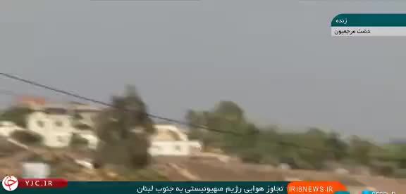   لحظه بمباران جنوب لبنان توسط جنگنده‌های اسرائیل حین پخش زنده شبکه خبر