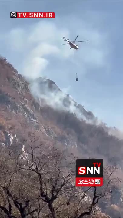   تلاش بالگرد هلال احمر برای اطفای حریق جنگل‌های توسکستان استان گلستان
