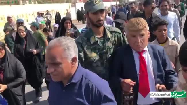   دستگیری ترامپ وسط راهپیمایی ۲۲ بهمن با شیشه مشروبات الکلی!