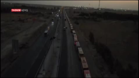   تصاویر هوایی از صف اتوبوس‌های منتهی به پایانه شهید رئیسی در مرز مهران