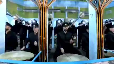 تصاویری از نقاره زنی در شب میلاد امام رضا