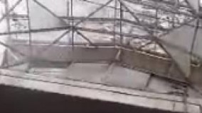 طرف طبقه زیرزمین پلاسکو وایساده داره فیلمبرداری میکنه یکدفعه همش اوار میشه