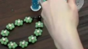 آموزش بافت گل منجقی