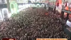 نصب پرچم بر گنبد امام حسین