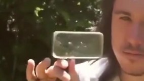 کشیدن نقاشی با نور آفتاب و ذره بین 