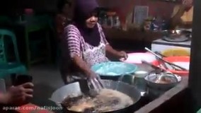 دست زدن این خانوم به روغن داغ در حال غول غول