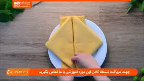 مراحل تا کردن دستمال سفره به شکل لوزی برای میز ناهار