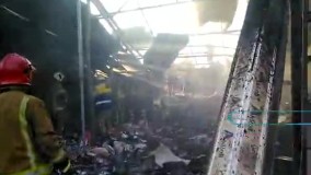 تصاویری از حادثه آتش‌سوزی در بازار گل محلاتیِ تهران