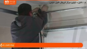 نصب کرکره برقی - تعویض فنر پیچشی درب کرکره برقی