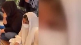 دختر علی سلیمانی با لباس سفید سر مزار پدر5596585