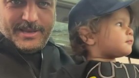 دور دور کردن سام درخشانی  به همراه پسرش