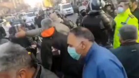 اعتراض جانبازان در تهران به کف خیابان کشید