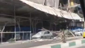 ریزش داربست ساختمانی خیابان وزرا تهران ۲