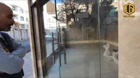 کرکره تجاری اتوماتیک به همراه درب شیشه ای سکوریت