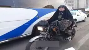 ویدیویی جالب از موتورسواری یک زن با چادر در تهران